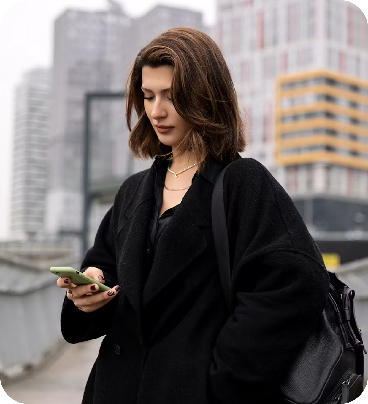 Woman using Drahmi on her phone